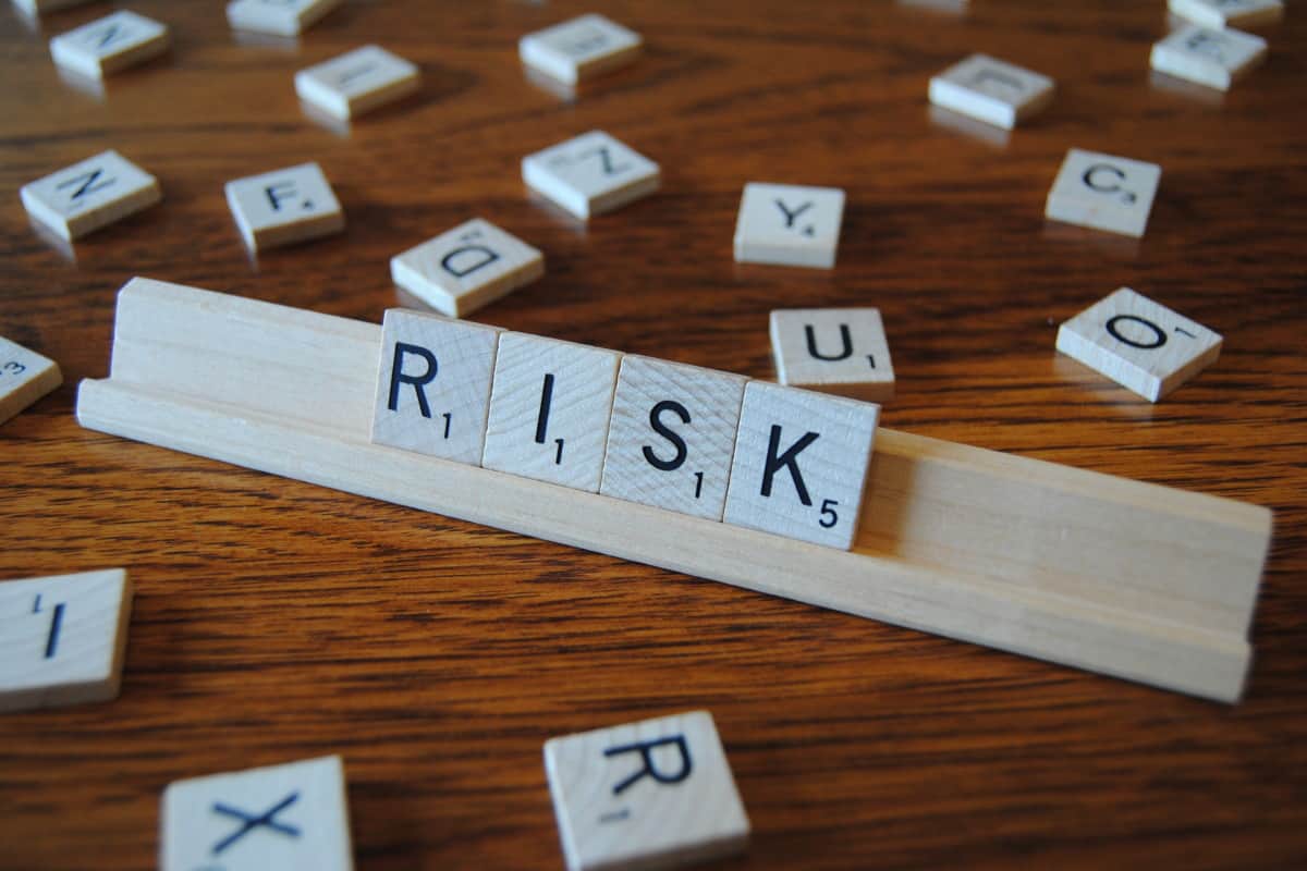 The word risk, pertinent to Nature Climate Change research, is spelled out on a wooden board.