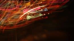 A blurry image of colorful lights at night in a special issue of the Journal of Cleaner Production.