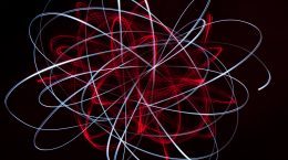 A red and blue light painting on a black background, featured in the INOGOV Special Issue.